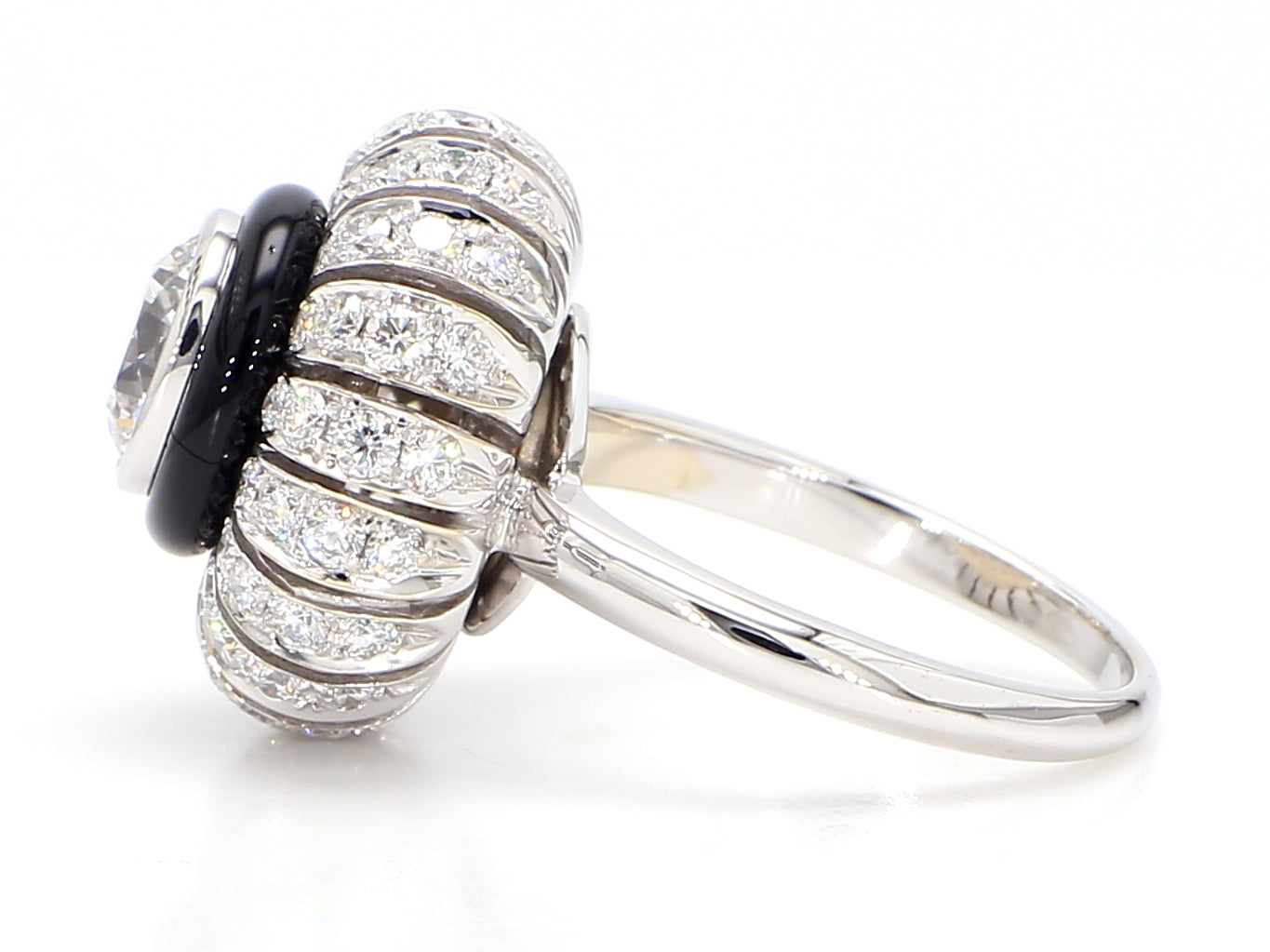 TORUS RING 2.47 CARAT TOTAL WEIGHT, TRIPLE EXCELLENT ROUND BRILLIANT 1.21 BR F VS1, GIA #3255695972, 1.26 MELEE, BLACK ONYX, 18K WHITE GOLD