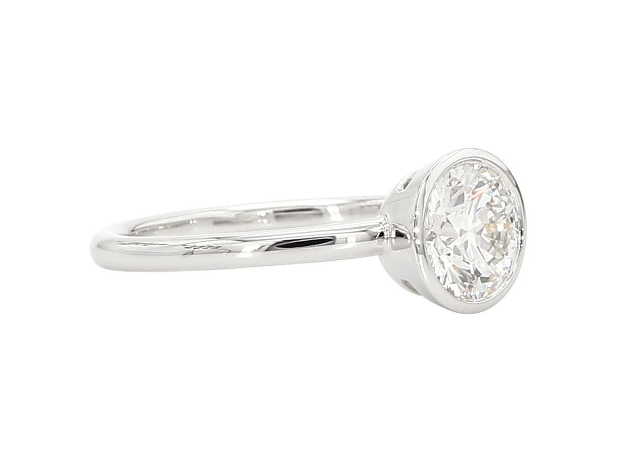 BEZEL DIAMOND RING, GIA, 2017, report no. 2254711037: 1.03 carats, EX, EX, F VS1