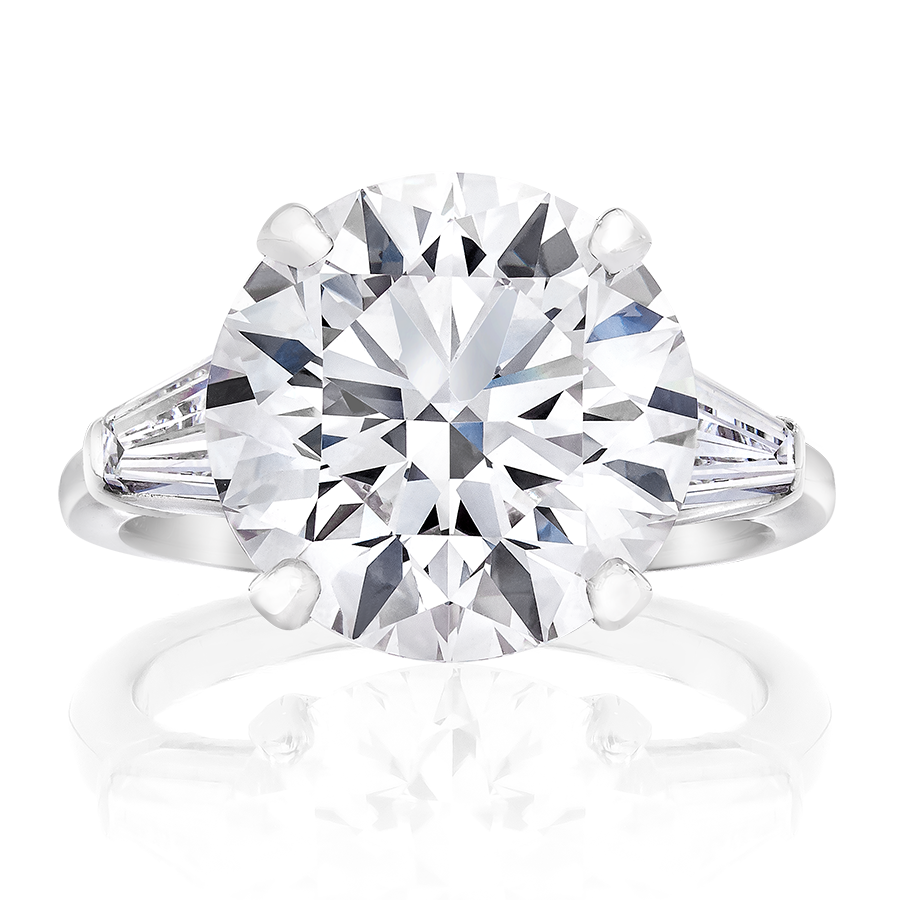 ENGAGEMENT RING, ROUND AND TAPERED BAGUETTES, 18K OR PLATINUM