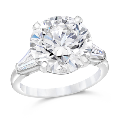 ENGAGEMENT RING, ROUND AND TAPERED BAGUETTES, 18K OR PLATINUM
