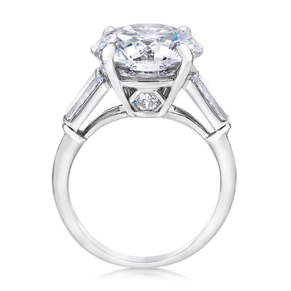 ENGAGEMENT RING, ROUND AND TAPERED BAGUETTES, 18K OR PLATINUM