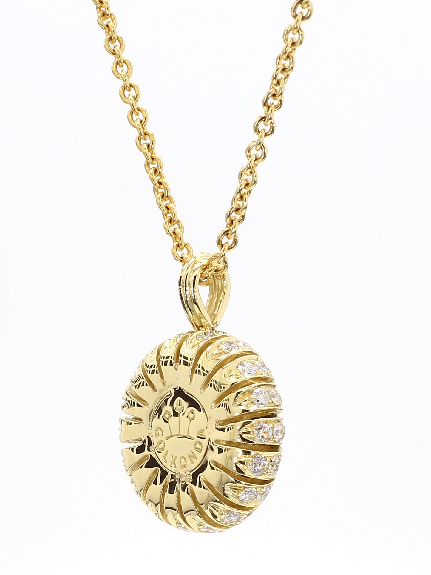 TORUS NECKLACE 2.29 CARAT TOTAL WEIGHT, TRIPLE EXCELLENT ROUND BRILLIANT 1.02 E VS1, GIA #7221403423, 1.27 MELEE, BLACK ONYX, 18K YELLOW GOLD