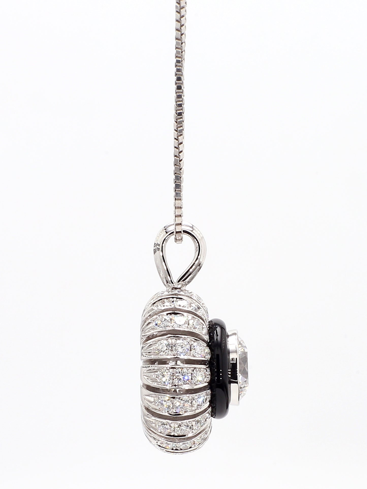 TORUS NECKLACE 2.53 CARAT TOTAL WEIGHT, TRIPLE EXCELLENT ROUND BRILLIANT, 1.26 E VVS1, GIA #2151110355, 1.27 MELEE, BLACK ONYX, 18K WHITE GOLD