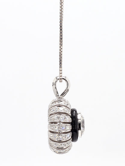 TORUS NECKLACE 2.53 CARAT TOTAL WEIGHT, TRIPLE EXCELLENT ROUND BRILLIANT, 1.26 E VVS1, GIA #2151110355, 1.27 MELEE, BLACK ONYX, 18K WHITE GOLD